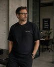 Male model wearing the Shevelo Latent space heavyweight oversized tee in Faded black.