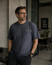 Male model wearing the Shevelo Latent intent heavyweight oversized tee in Faded indigo.