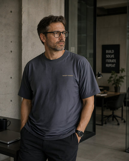 Male model wearing the Shevelo Latent intent heavyweight oversized tee in Faded indigo.